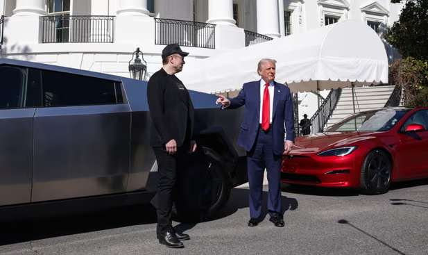 Trump and Elon standing in front of a Cybertruck